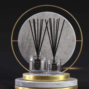 a bottle of oud scented diffuser with reeds sticks